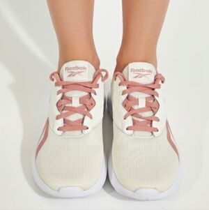 Reebok Energen Lux women's running shoes, in cream and pink.
